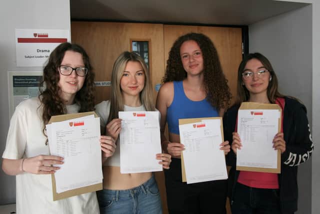 (L to R) Cait Healy, Grace Burrows, Kacey Chen and Elizabeth Burrows celebrate their results