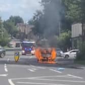 A car burst into flames on Darnall Road, Darnall Sheffield. Submitted picture, taken from a video, shows the vehicle alight.