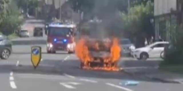 A car burst into flames on Darnall Road, Darnall Sheffield. Submitted picture, taken from a video, shows the vehicle alight.