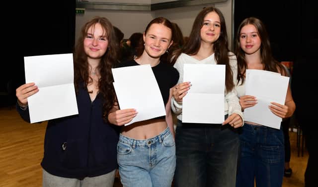 Four students from Silverdale School in Sheffield, which says the cohort as a whole "achieved results they can be proud of".