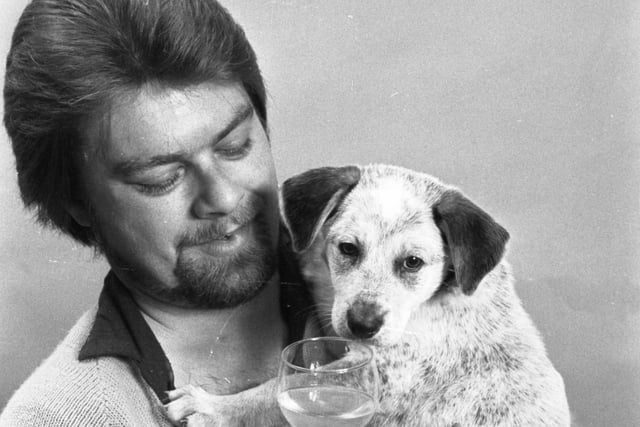 Pub manager Dennis Reading had some soft refreshments for this little puppy in 1982.