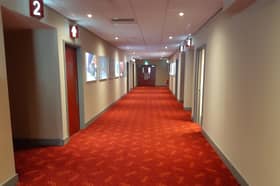 Cinema tickets will be on offer for £3 to mark National Cinema Day at Vue in Sheffield. File picture shows a cinema corridor. Picture: David Kessen, National World