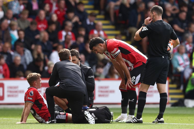 Given the nod at left wing-back over Larouci but lasted only 15 minutes before going down for treatment and making way for the Frenchman, in the latest injury concern for the Blades 