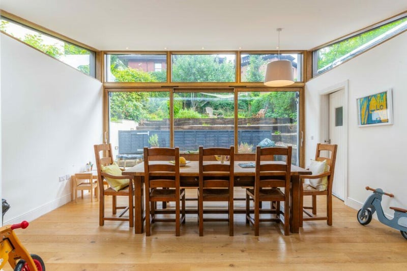 One of the great features about the kitchen is the incredible sliding doors onto the garden with plenty of space for a dining area. 