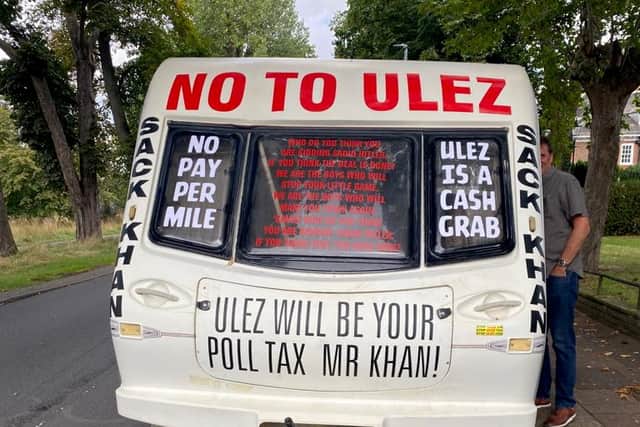 The van also features a picture of the mayor accompanied by a speech bubble stating: "Pay me £12.50 and you can pollute for 24 hours."  