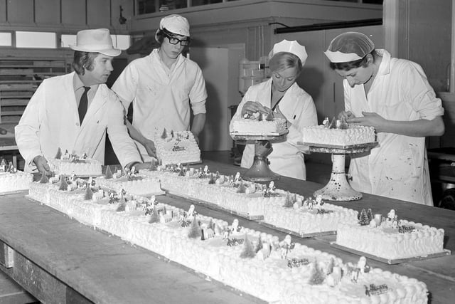 Pictured decorating cakes at Milburns in 1973 were (left to right) Mr D Leng, bakery manager, and cake decorators Mr David Pescod, Miss Maureen Montgomery, and Miss Jean Hebson