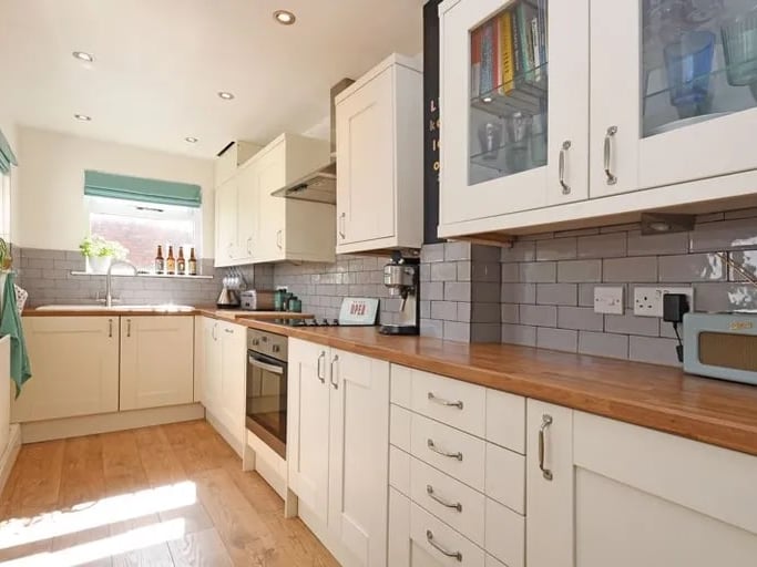 The kitchen is shared with an open plan dining area. (Photo courtesy of Zoopla)
