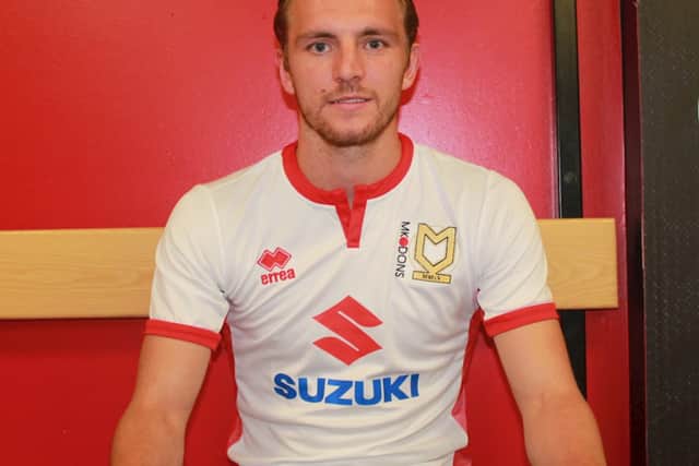 Alex Gilbey signed for Dons from Wigan in 2017