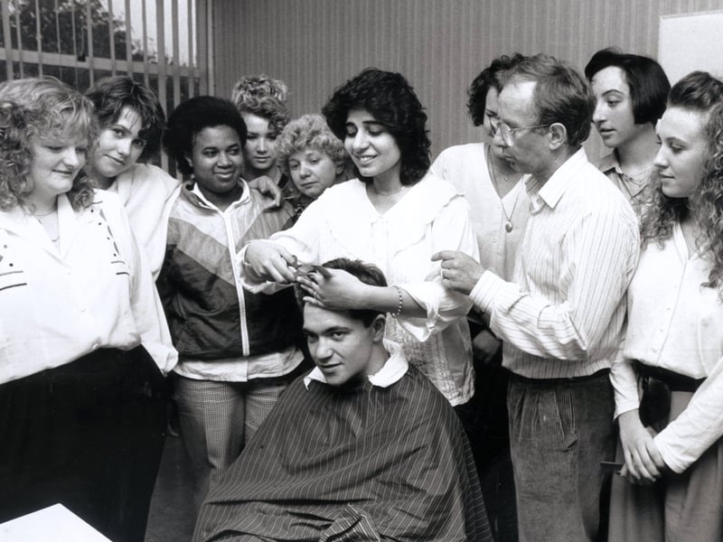 Fehmida Meralis at work on the head of Greg Furze, at Castle College hairdressing department, Sheffield, in October 1990