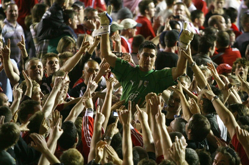 Bristol City fans lift goalkeeper Adriano Basso onto their shoulders at the end of the Coca-Cola Championship play-off semi final match against Crystal Palace at Ashton Gate on May 13, 2008 (Photo by Paul Gilham/Getty Images)