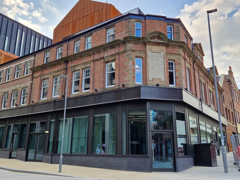 Corner of Wellington Street and Cambridge Street in September 2023. It is currently empty but is one of the visibly completed pieces of the Heart of the City development.