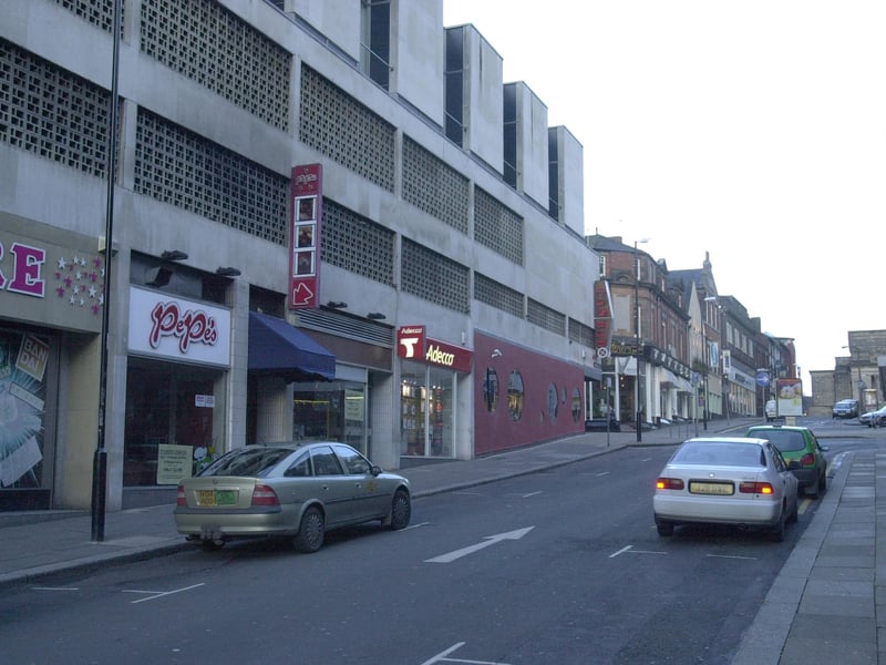The old Cambridge Street shops in 2001. The shops were demolished in 2016, but stores seen here include Pepe's and Adecco.