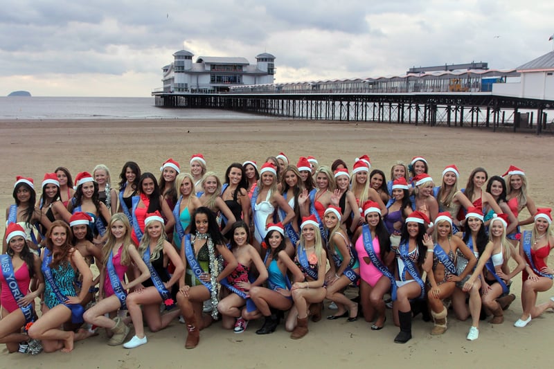 Finalists in the Miss Great Britain beauty pagent brave temperatures of -2 as they gather for a photocall on the beach in front of Weston-Super-Mare’s Grand Pier on December 2, 2010. The final of Miss Great Britain, the oldest beauty contest in the UK took place at the Edwardian pier, which had just re-opened to the public after a refurbishment programme costing £51m. (Photo by Matt Cardy/Getty Images)