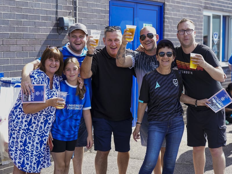 Fans pose outside Fratton Park ahead of Pompey v Peterborough United