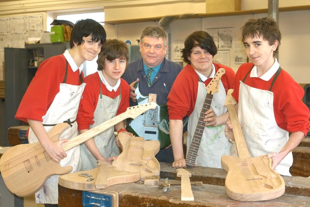These Usworth School pupils were making guitars for themselves when our photographer was there in 2007.
Here are Leslie Kay, Sean Perrin, Chris French, and Mark Bainbridge with teacher Jim Kelly.