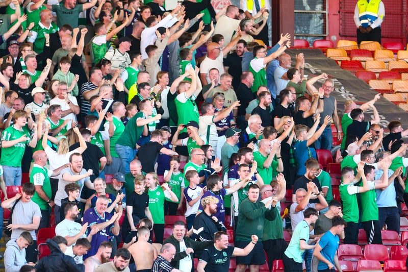 Hibs fans celebrate at Pittodrie.