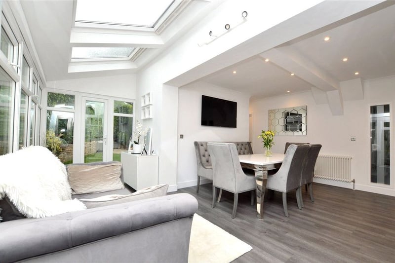 The dining area combines with a large family area with access to the rear garden.