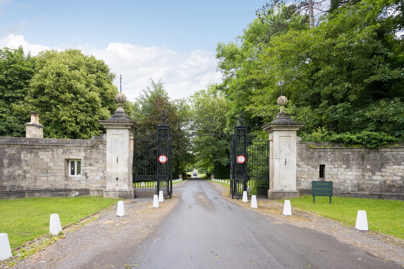 An impressive driveway leads to the mansion