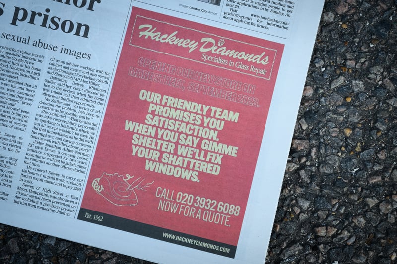 An advertisement for the “Hackney Diamonds Glass Repair” company in the Hackney Gazette on August 23, 2023. (Photo by Leon Neal/Getty Images)