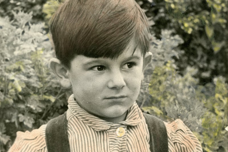 Ronald David Wood (Ronnie Wood) aged four in 1951, at his home in Whitehorn Avenue, Yiewsley, west London.  The image was part of The Rolling Stones - Exhibitionism at the Saatchi Gallery in 2016. (Photo by Property RW/Getty Images)