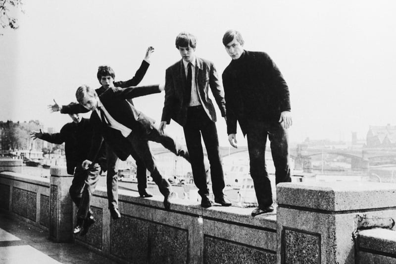 The Rolling Stones messing about on a wall at Embankment on May 4 1963. (Photo by Keystone Features/Hulton Archive/Getty Images)