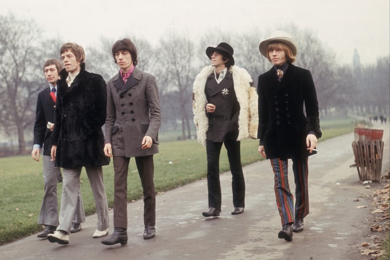 Charlie Watts, Mick Jagger, Bill Wyman, Keith Richards and Brian Jones take a walk in the park in 1967.  (Photo by Keystone/Getty Images)