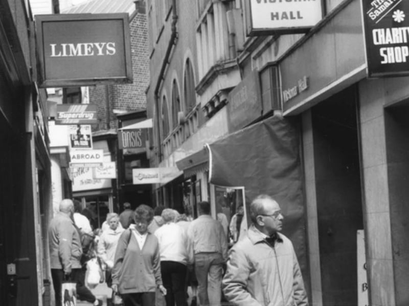 Shoppers on Chapel Walk, Sheffield, showing No. 44, Limeys Ltd and the entrance to Victoria Hall, in 1994. Photo: Picture Sheffield