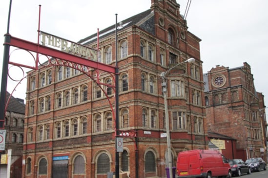 Built 1876-79, and designed by architect Matthew Forsyth (1850-80). The former factory comprises of three ornate red and white brick buildings around the Barras, which were originally linked by an equally ornate two storey building filling the site between the three buildings. The three buildings sited in the Gallowgate at the east end of the Barras market area have Italian renaissance inspired design details and have some of the most intricate and ornate use of brick to be found within the city. Originally a clay pipe factory, the three buildings are currently a mix of commercial and residential usage. The buildings are category B listed.