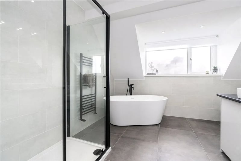 The stunning family bathroom with detached bathtub.