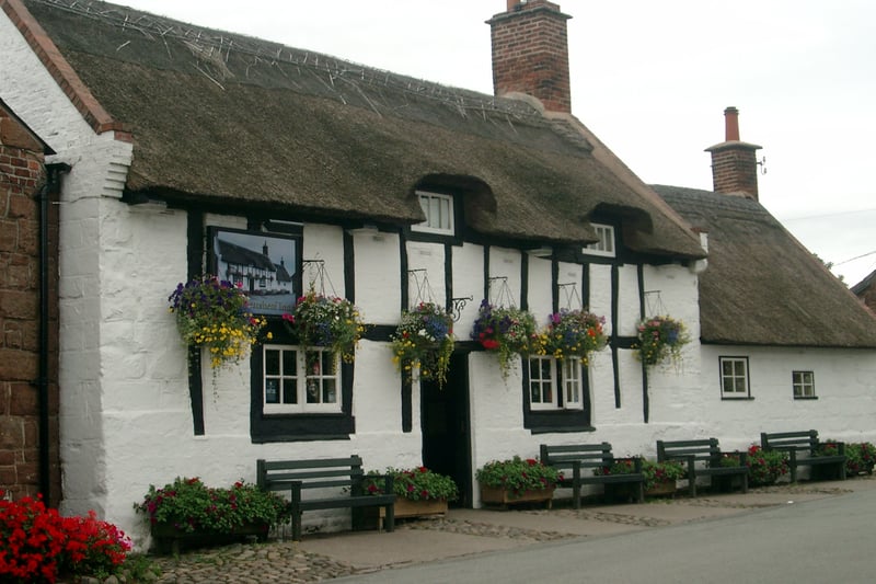 The datestone on this timber framed, thatched roofed pub reads 1611 and it sits in the hamlet of Raby, close to the border of Merseyside and Cheshire. Historic England first issued the building Grade II-listed status in 1962. Camra give the pub two heritage stars for an interior of outstanding national historic interest, adding: “It is well worth a visit to see the old snug created by settles around a large table situated in front of a large brick fireplace.”