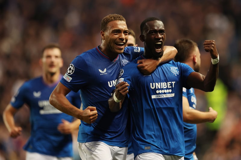 Abdallah Sima celebrates his goal for Rangers with team-mate Cyriel Dessers during their Champions League play-off round first-leg against PSV Eindhoven.