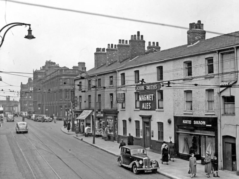 Leopold Street, Sheffield city centre, in 1952, with premises including the Three Tuns pub and the Kate Saxon gown specialist, with the former Assay Office in the background. Photo: Picture Sheffield/Press Photo Agency