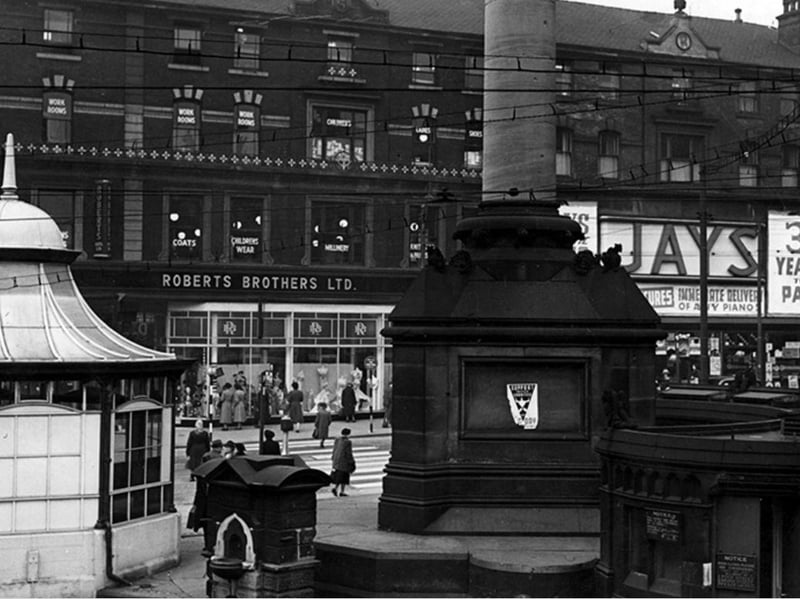 Moorhead, Sheffield, in 1952, showing the Passenger Transport Enquiry Office, drinking fountain and base of the Crimean Monument in the foreground. In the background, Roberts Brothers Ltd drapers and Jay's Furnishing Stores are visible. Photo: Picture Sheffield/Press Photo Agency