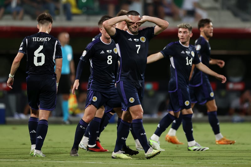 John McGinn of Scotland celebrates after scoring the team’s third goal.