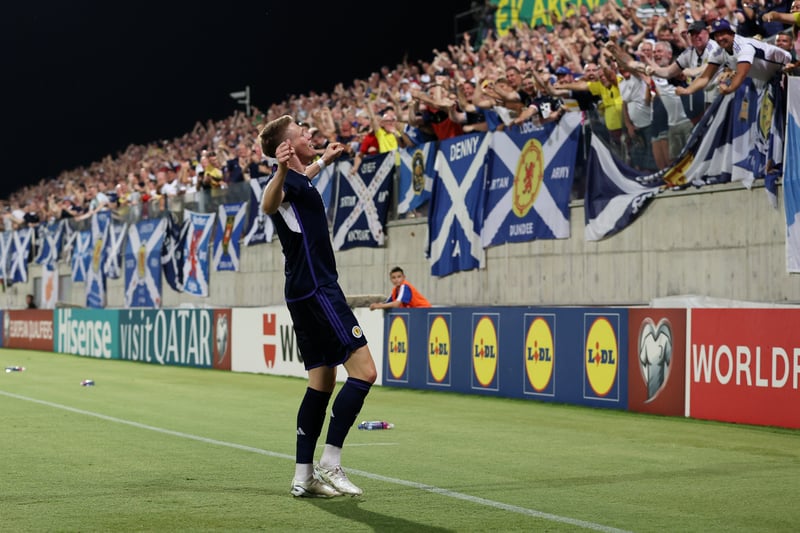 Scott McTominay of Scotland celebrates with fans.