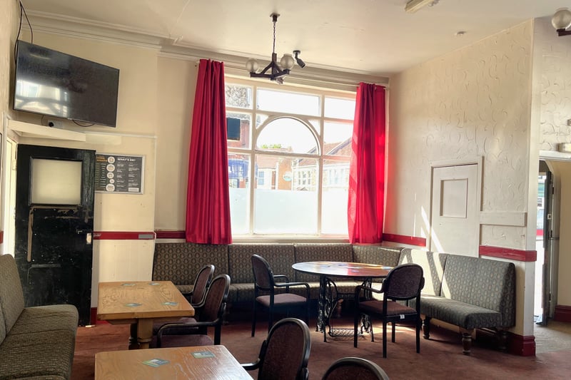 With its high ceilings and basic furniture, the pub has a timeless look.