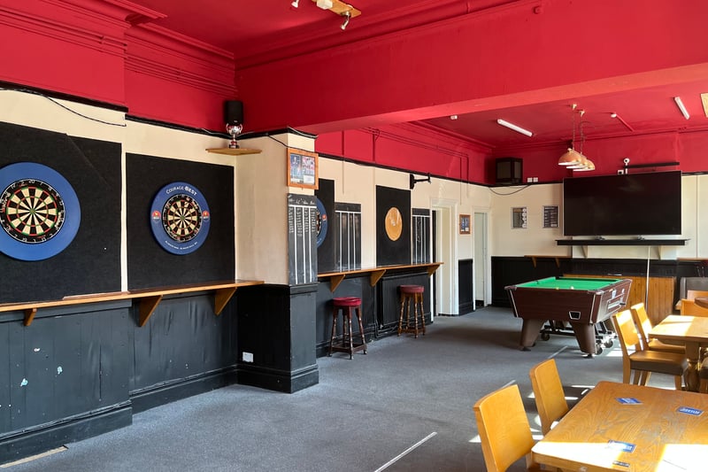 There are no less than five dart boards and pool table in the front room of The Sandringham, plus a skittle alley upstairs