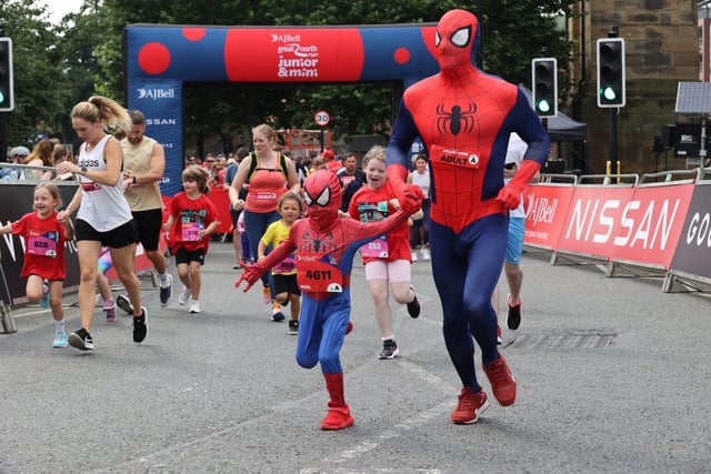 Little and large Spider-Man take on the run
Credit: North News and Pictures