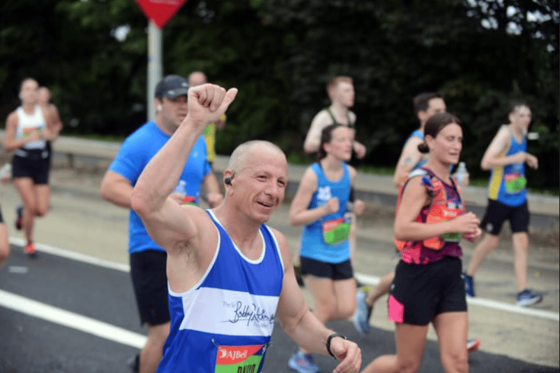 Great North Run 2023 runner Davey Adams heads down the John Reid Road with the finish line almost in site. Credit: Stu Norton