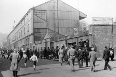 Fans heading along Firhll Road to Firhill Stadium in 1958. 