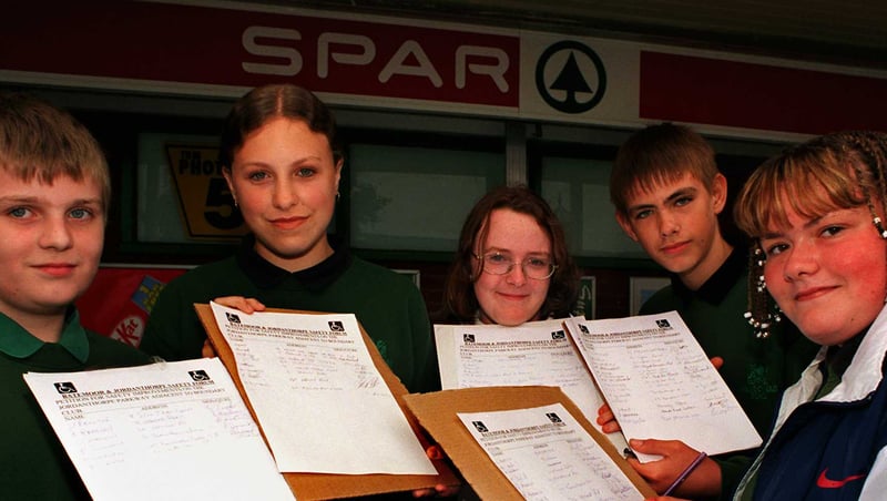Meadowhead School pupils Graham Compton, Jenny Lee Wingfield, Sara Burnham, Neil Whittaker and Michelle Firth collecting signatures  outside the Spar store on Dyche Lane, Sheffield, for a petition to raise awareness about road saftey in the Meadowhead area in 1998
