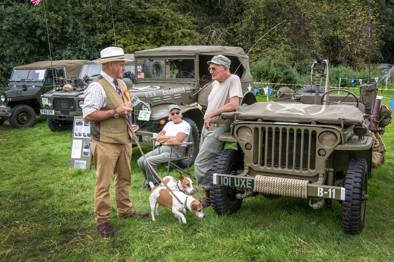 A judge chats with exhibitors withn their military vehicles at he 25th Otley Vintage Transport Extravaganza at Knotford
Nook.