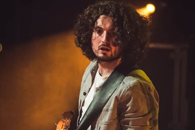 Joe Carnall on stage.