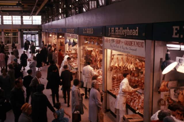 J.H.Holyhead and L.C. Ward butchers at Sheffield's old Castle Market, looking towards the doorway to Castlegate. Photo: Picture Sheffield