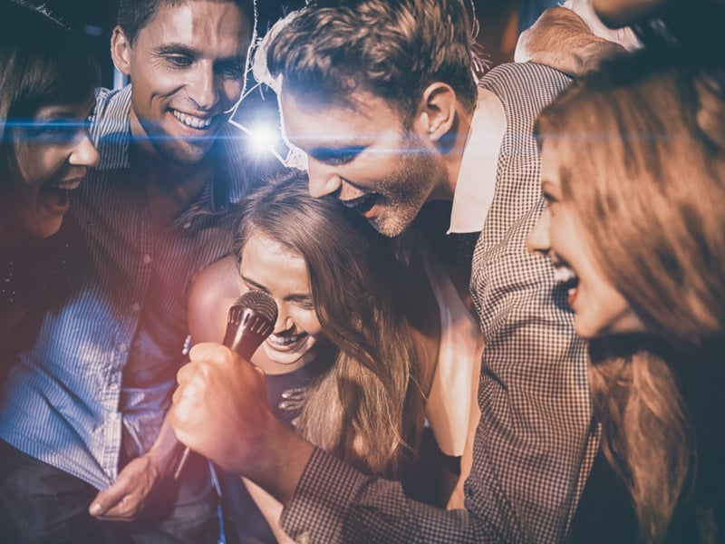 Let your voice soar as you take on singing challenges or just have a good time crooning your favourites at Karaoke Box on Broad Street. (Photo - vectorfusionart - stock.adobe.co)