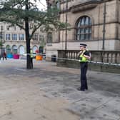 Police have provided an update on their investigation after a boy, 14 was stabbed near Sheffield Town Hall. Pictured is the police line outside Town Hall yesterday. Picture: David Kessen, National World