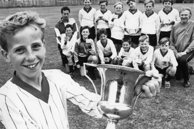Captain Stewart Williamson and the South Shields Primary School football team with the Derwent and Medomsley Cup. The team beat Kelloe 6-1 in the final of the under 11 competition held in South Shields. Does this bring back happy memories? Photo: Shields Gazette