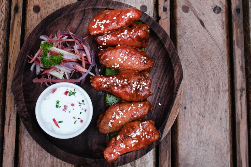 This chicken restaurant is rated 3.6 from 156 reviews. One customer wrote: “Best wings in Brum.” (Photo - Unsplash)