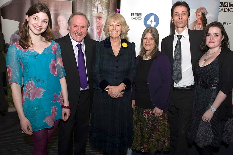 Queen Camilla with “The Grundy’s” Archers actors (L-R) Emerald O’Hanranhan, who plays Emma Grundy, Trevor Harrison who plays Eddie Grundy, Rosalind Adams who plays Clarie Grundy, Rundy Philip Molloy who plays William Grundy and Becky Wright who plays Nic Hanson during the Duchess’s visit to BBC Birmingham on February 16, 2011 in Birmingham, England. (Photo by Arthur Edwards - WPA Pool via Getty Images)