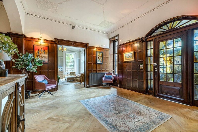 Westbourne Gardens grand, pillared, private entrance leads to this entrance vestibule with panelled wooden walls